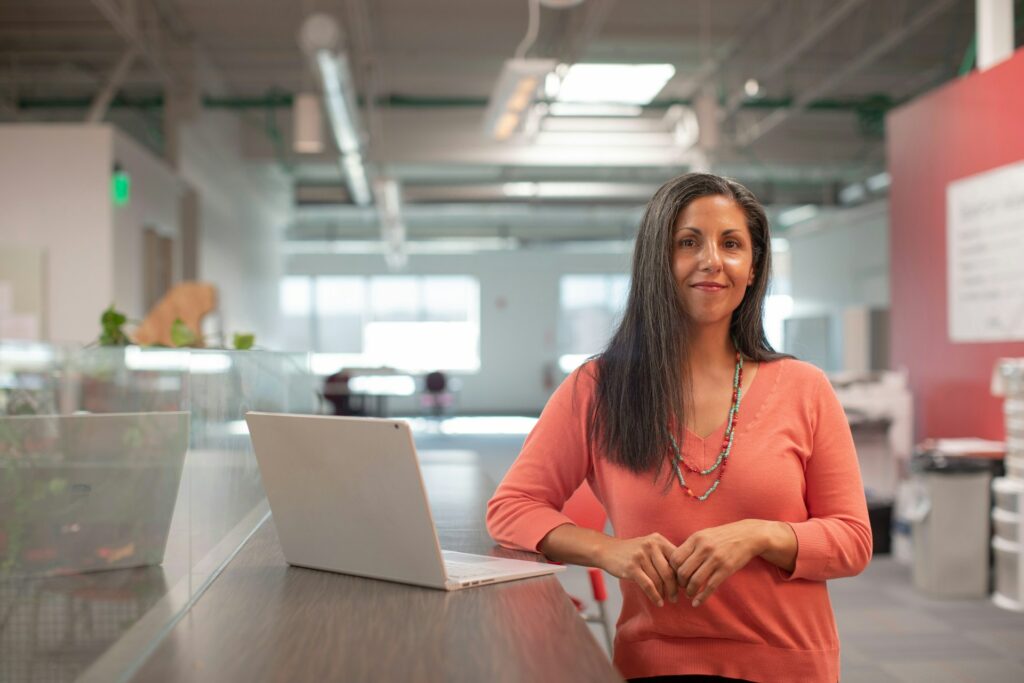 Woman at desk working in incident reporting office