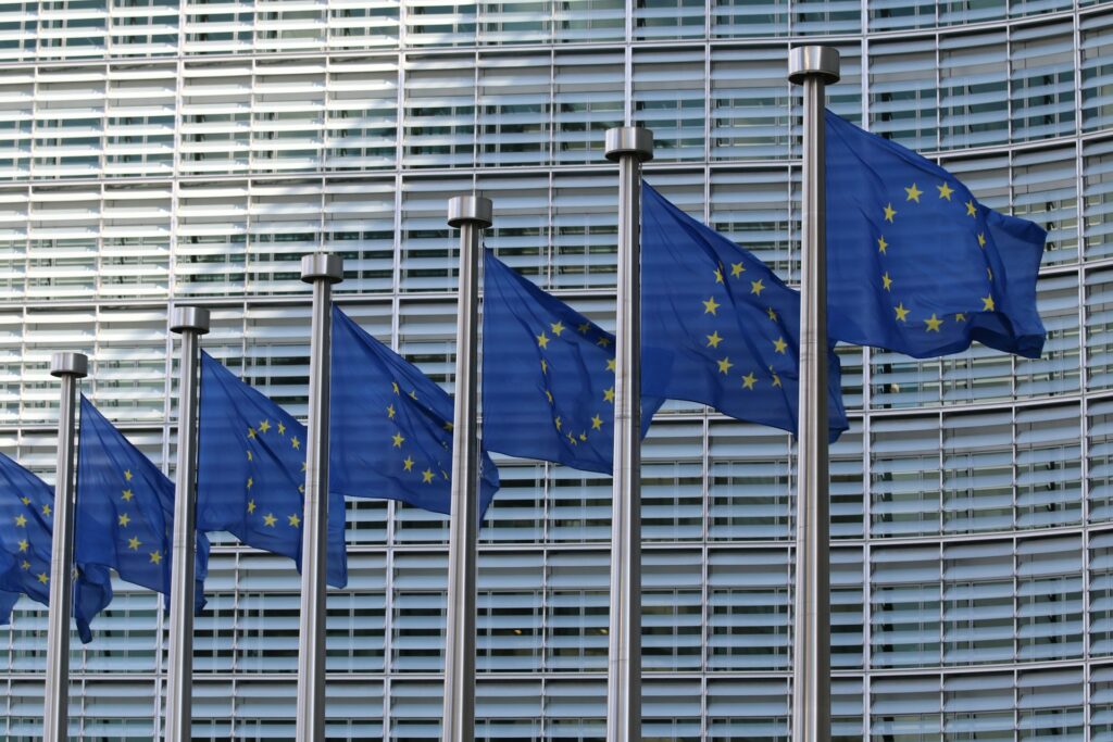 EU Flags in a row representing AI compliance